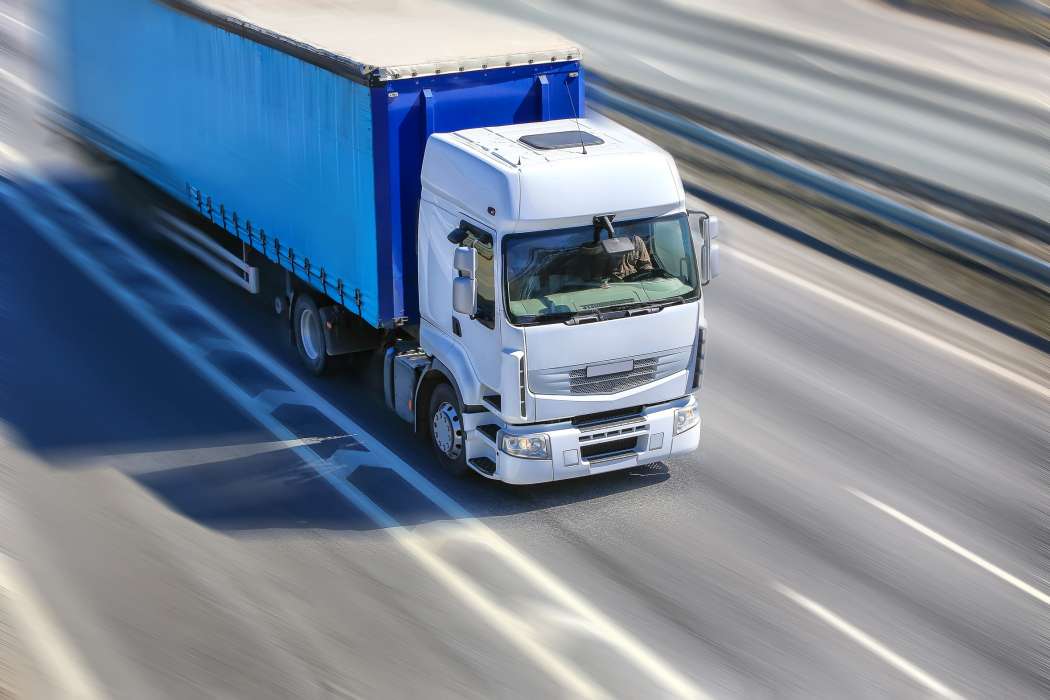 Lorry transporting electronics good using Reusable Box