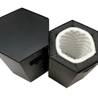 Photo of a hexagon reusable box with the lid sitting beside it
