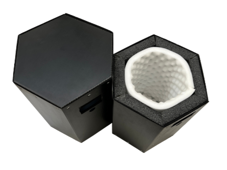 Photo of a hexagon reusable box with the lid sitting beside it