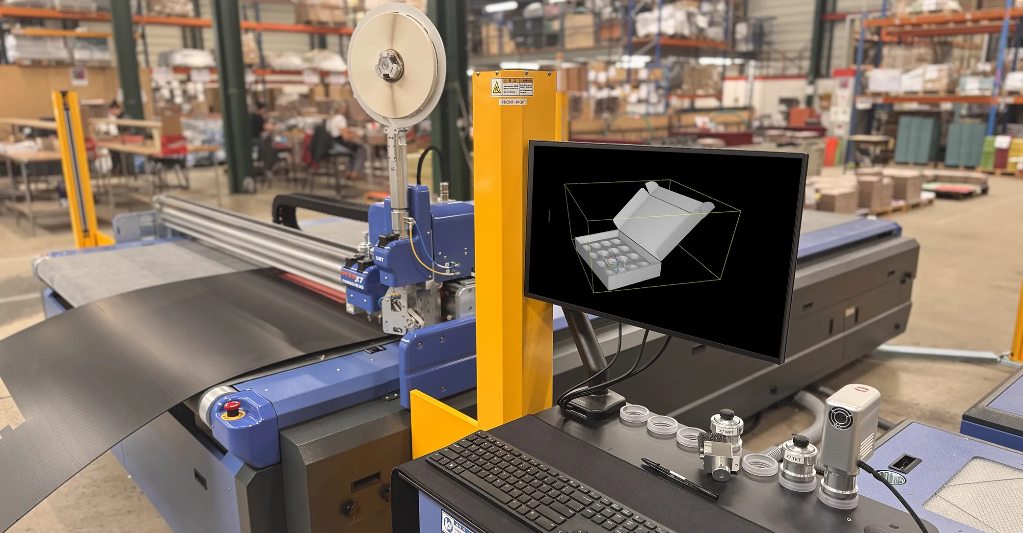 Photo of the cutting machine on the factory floor
